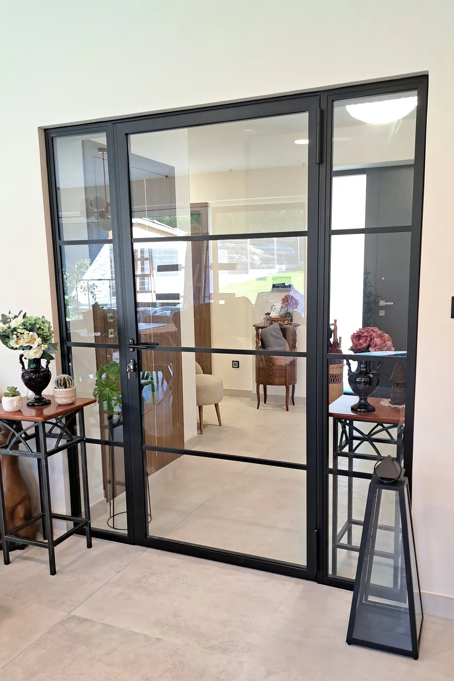 Hinged door with side panels
