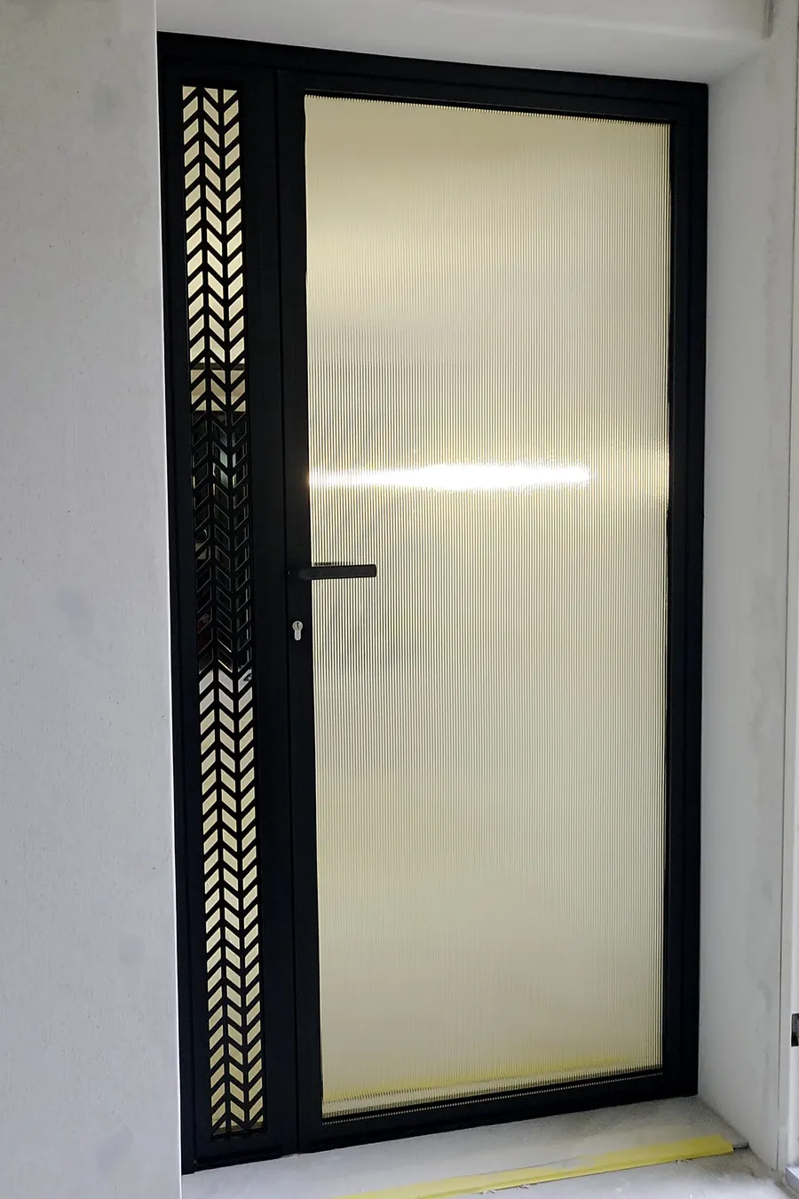 Basement door, fluted glass
